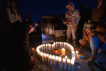 Soquoia Green, a cousin of Tyre Nichols, lights candles with family and friends during a vigil for him late Monday, Jan. 30, 2023, at Regency Community Skate Park in Natomas, where Tyree used to skateboard when he lived in Sacramento, Calif.