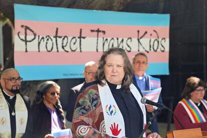 Rev. Pat Langlois, senior pastor of MCC Church of Christ of the Valley, speaks at an interfaith rally in Pasadena, Calif., on March 31, 2023