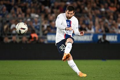 PSG's forward Lionel Messi kicks the ball during the French L1 football match between RC Strasbourg Alsace and PSG at Stade de la Meinau in Strasbourg, France, on May 27, 2023.