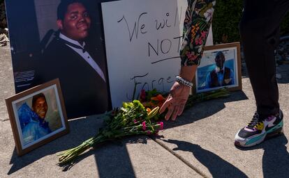 Flowers near a photo of Herman Whitfield III, just outside Indianapolis Metropolitan Police Department's north district station in Indianapolis, on April 11, 2023.