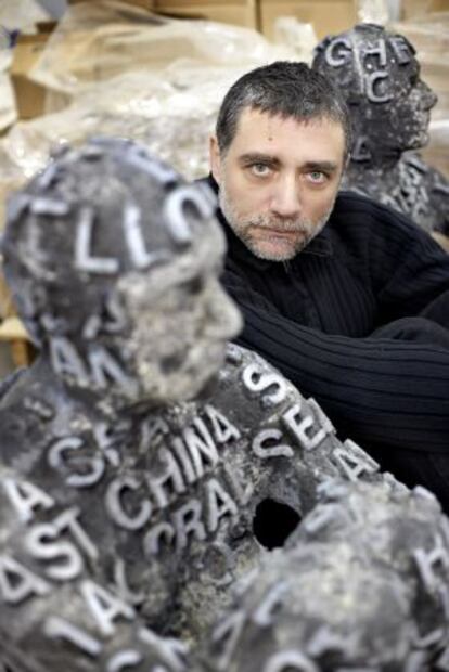 The sculptor Jaume Plensa poses with some of his work.