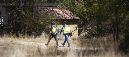 Forensic officers at the location where the latest victim was found.