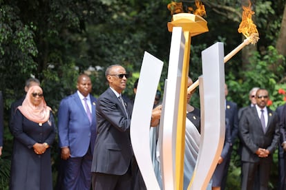 Rwandan President Paul Kagame and first lady Jeanette Kagame prepare to light the flame of hope to commemorate the 1994 genocide at the Genocide Memorial Center in Kigali