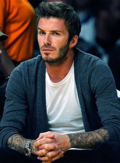 David Beckham, como espectador en un  partido de la NBA.