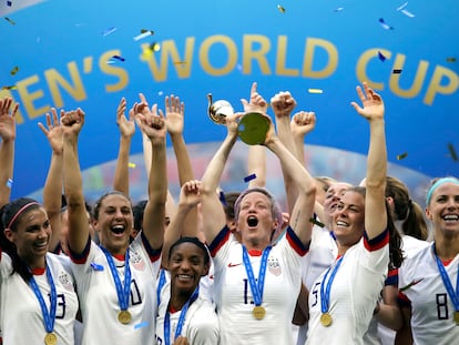 United States' Megan Rapinoe lifts up the trophy after winning the Women's World Cup final soccer match between US and The Netherlands at the Stade de Lyon in Decines, outside Lyon, France, in July 7, 2019.
