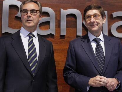 El presidente de Bankia, José Ignacio Goirigolzarri (d), y el consejero delegado, José Sevilla