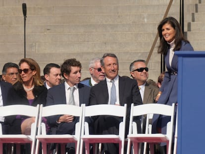 Former South Carolina Gov. Nikki Haley, right, takes her seat next to former Gov. Mark Sanford at the second inaugural of Gov. Henry McMaster on Wednesday, Jan. 11, 2023, in Columbia, S.C.