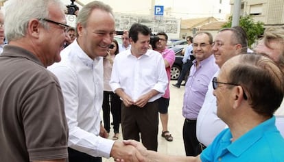 El president de la Generalitat Alberto Fabra y el presidente de la Región de Murcia Ramón Luis Valcárcel ayer en Pilar de la Horadada.