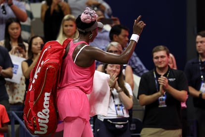 Venus Williams of the U.S. acknowledges fans after losing her first round match against Belgium's Greet Minnen.