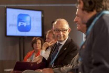 El ministro de Hacienda y Administraciones Públicas, Cristóbal Montoro, durante su participación en la segunda jornada de la Escuela de Verano del PP que se celebra en Gandía.