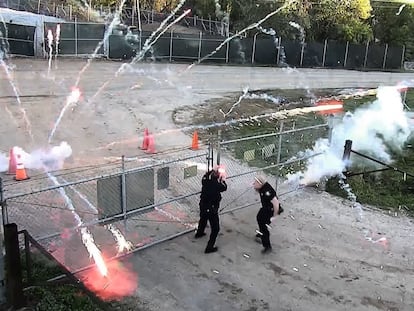 This screen grab taken from a video provided by the Atlanta Police Department shows protesters throwing bricks at a construction site in Atlanta on March 5, 2023.