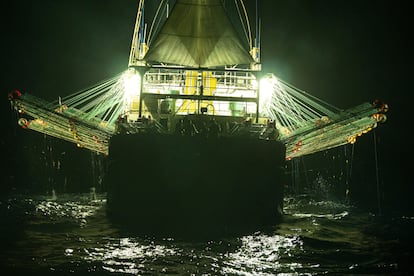 The Chang Tai 802, a Chinese-flagged ship, fishes for squid at night on the high seas off the west coast of South America.