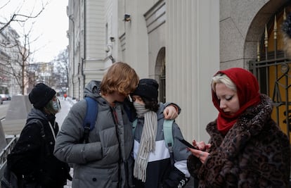 People gather outside the building of Russia’s Supreme Court