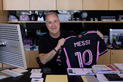 Inter Miami owner and director Jorge Mas in his Coral Gables office with a preliminary design of Lionel Messi's new jersey