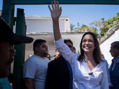 Venezuelan opposition leader María Corina Machado greets her supporters during an event in Caracas.