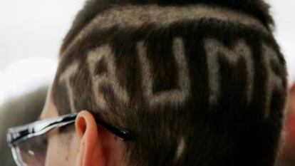 Fourteen year-old David Fargnoli has "TRUMP" shaved into his hair before a campaign rally with U.S. Republican presidential candidate Donald Trump in Warwick