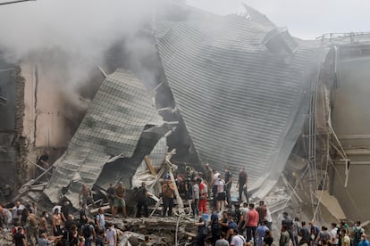 Rescue workers and volunteers are searching for survivors in the rubble of the Ohmatdyt children's hospital, which was attacked by Russian missiles on Monday in kyiv.