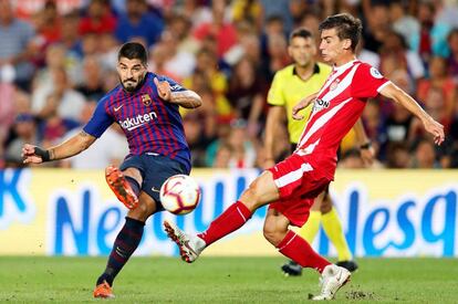 Luis Suárez i Pere Pons durant el partit de diumenge.
 