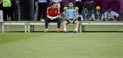 Casillas y Xavi conversan durante el entrenamiento.