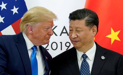 El presidente de EE UU, Donald Trump, junto al presidente de China, Xi Jinping, en junio de 2019 durante el G20 en Japón.