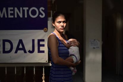 Elaine Miranda and her baby, stuck in Mexico.