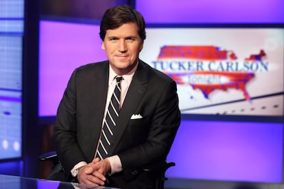 Tucker Carlson poses for photos in a Fox News Channel studio on March 2, 2017, in New York.