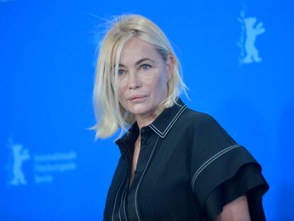 French actress Emmanuelle Beart poses during the photo call for the film 'Les passagers de la nuit' (The Passengers of the Night) by French director Mikhael Hers shown in competition during the 72nd Berlinale Film Festival in Berlin on February 13, 2022. (Photo by Stefanie LOOS / AFP)