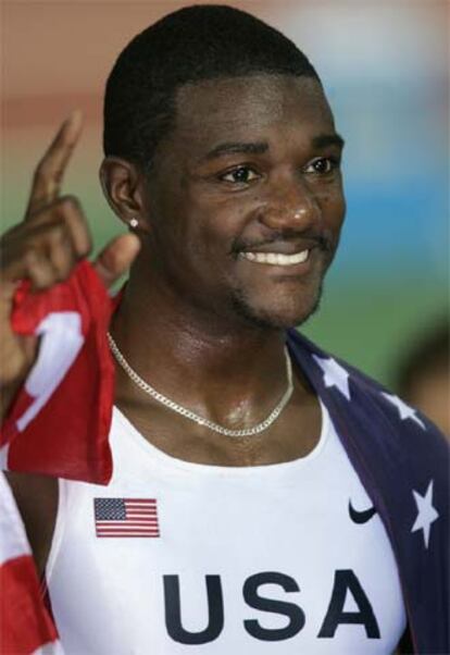 Justin Gatlin festeja su victoria.