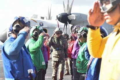 Sailors on the nuclear-powered aircraft carrier USS Carl Vinson in waters south of the Korean Peninsula, 15 January 2024.