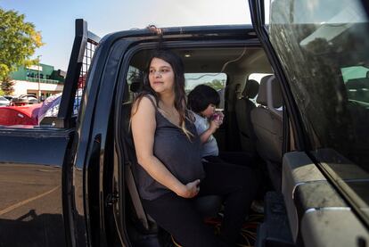 Hay River, N.W.T. fire evacuee Tanisha Edison, who is four days away from having a baby, and her daughter Delilah Betsaka, along with family members drove from Hay River to the St. Albert, Alta. evacuee center to escape the wildfires on Wednesday, Aug. 16, 2023.