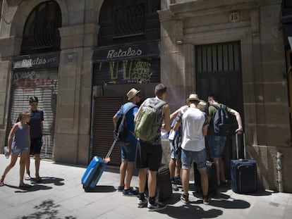 Tourists at a holiday apartment in Barcelona's Ciutat Vella.