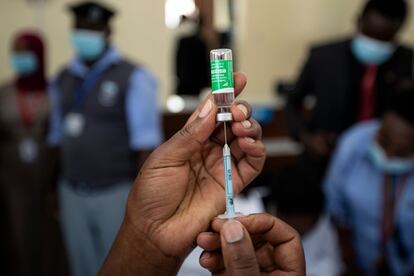 A nurse prepares a Covid-19 vaccine in Nairobi.