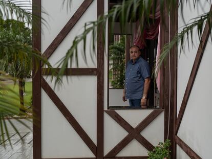 João Inácio Laufer, the mayor of Quatro Pontes – where Bolsonaro got 80% of the vote in the first round of Brazil’s elections – poses for a photo outside the municipal building