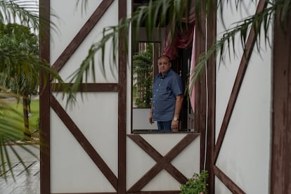 João Inácio Laufer, the mayor of Quatro Pontes – where Bolsonaro got 80% of the vote in the first round of Brazil’s elections – poses for a photo outside the municipal building