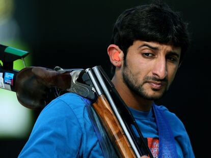 Juma al-Maktoum of United Arab Emirates with his shoulder rifle in the Olympic shooting competition.