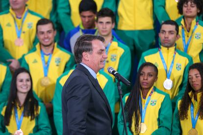 Bolsonaro recebeu atletas medalhistas no Pan de Lima em 2019.