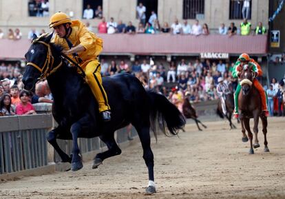 Jockey Giuseppe Zedde of the "Aquila" (Eagle) parish rides his horse during the third practices for the Palio of Siena, Italy August 14, 2017. REUTERS/Stefano Rellandini  NO SALES.