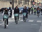 PARIS, FRANCE - MAY 13:  cyclists ride in a cycle lane in the "Rue de Rivoli" as France is slowly reopening after almost two months of strict lockdown throughout the country due to the epidemic of coronavirus (COVID 19) on May 13, 2020 in Paris, France. The mayor of Paris, Anne Hidalgo has decided to reserve the "rue de Rivoli" for bikes, buses, taxis and craftsmen's vehicles. This three-kilometer street, which crosses Paris, should be prohibited for private cars this decision will be formalized Tuesday or Wednesday. The Coronavirus (COVID-19) pandemic has spread to many countries across the world, claiming over 298,000 lives and infecting over 4.4 million people.  (Photo by Stephane Cardinale - Corbis/Corbis via Getty Images)