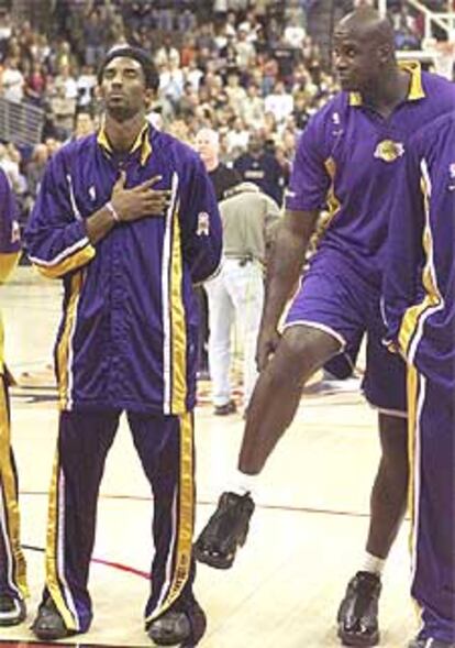 Kobe Bryant (a la izquierda) y Shaquille O'Neal.