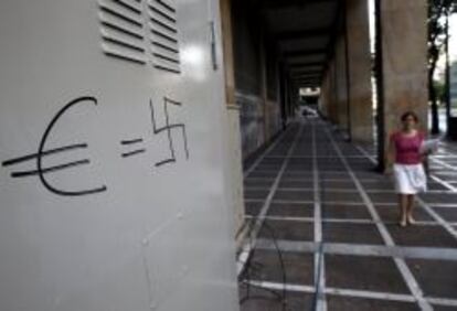 Grafiti en Atenas. REUTERS