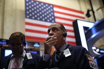 Corredores de la Bolsa de Nueva York antes de anunciarse el acuerdo.