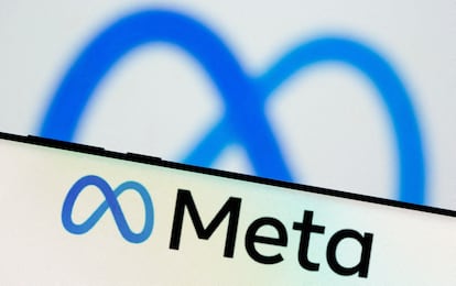 FILE PHOTO: Meta Platforms Inc's logo is seen on a smartphone in this illustration picture