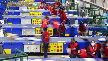 Alibaba workers prepare orders for the Chinese Black Friday.