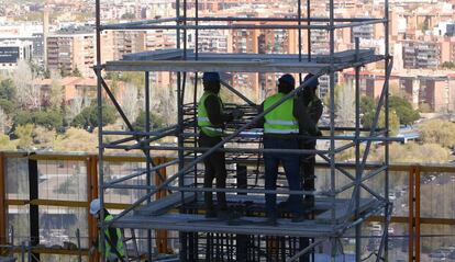 Construction workers at a site in Madrid.