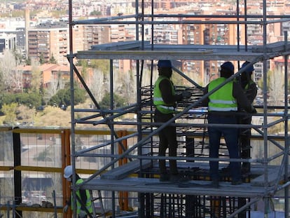 Construction workers at a site in Madrid.