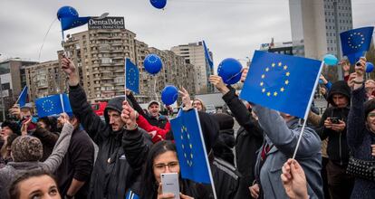 Romanians march with European Union flags in Bucharest in March.
