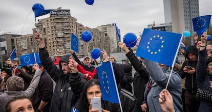 Romanians march with European Union flags in Bucharest in March.