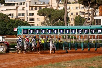 Jockeys compete during a horse race at Beirut Hippodrome, Lebanon, May 14, 2017. REUTERS/Jamal Saidi  SEARCH "SAIDI HIPPODROME" FOR THIS STORY. SEARCH "WIDER IMAGE" FOR ALL STORIES.