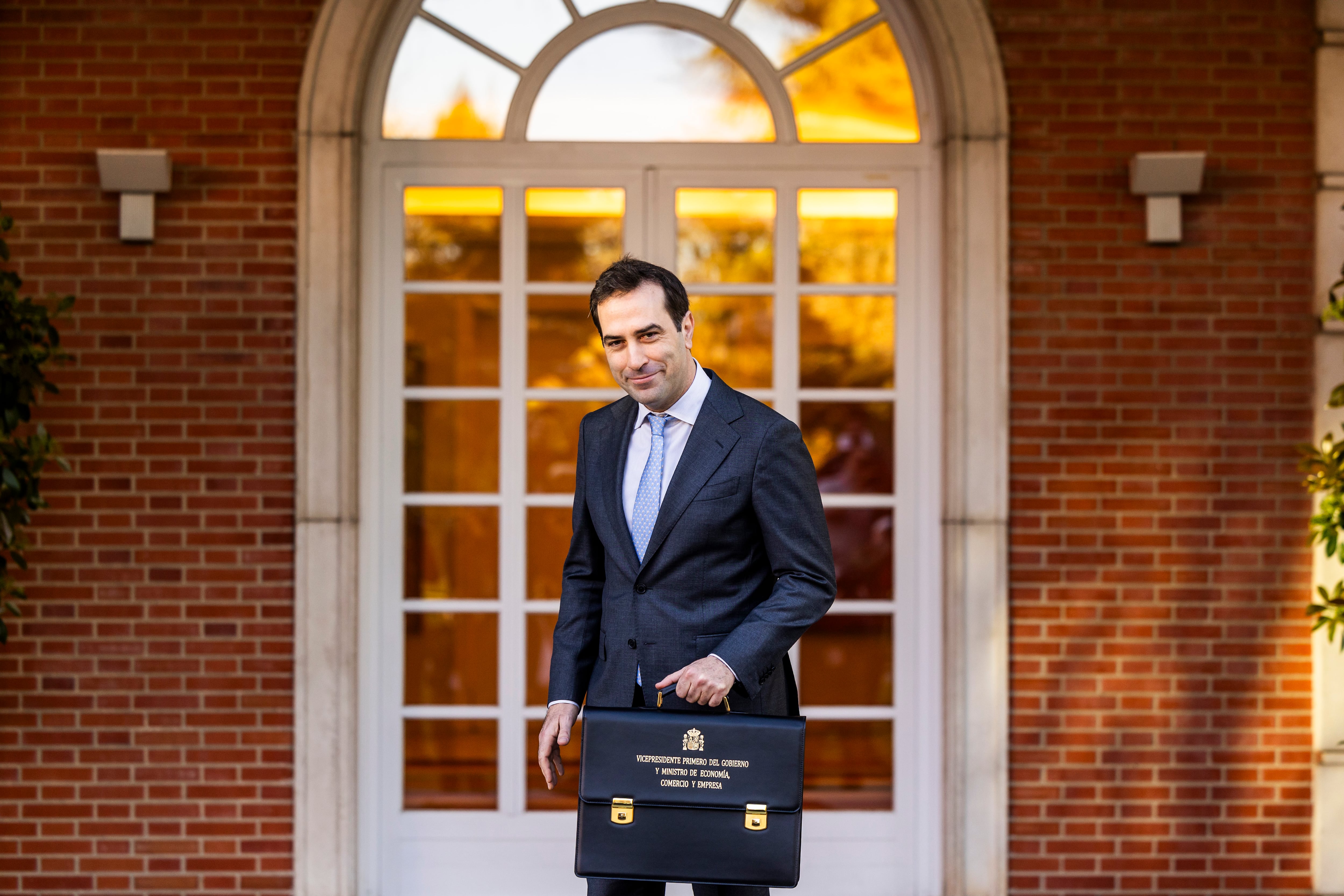 El vicepresidente primero y ministro de Economía, Comercio y Empresa, Carlos Cuerpo, a su llegada al Palacio de La Moncloa, este martes.