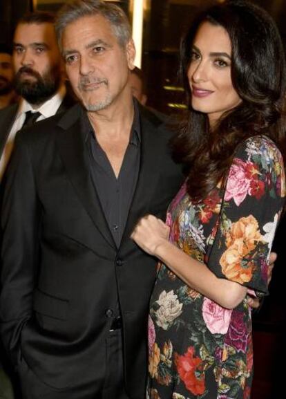 George y Amal Clooney, en la presentación de Cascos Blancos en Londres.